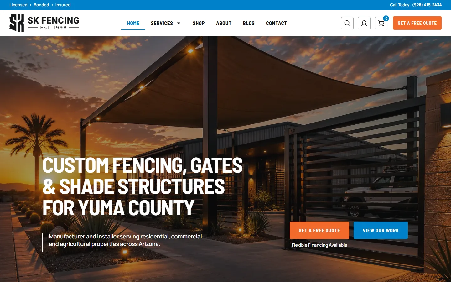 Fencing by SK homepage with a shade structure at sunset